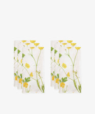 The Buttercup Linen Napkin, Set of 6, features white linen with a yellow and green floral print. Neatly arranged against a white background, these napkins add elegance and brighten any table setting.