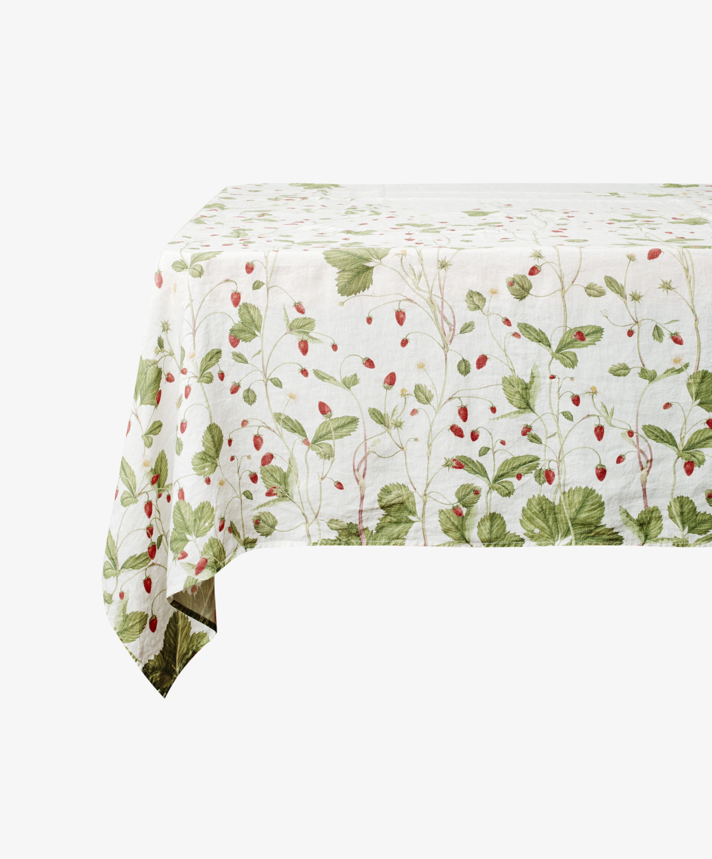 Fraise de Bois tablecloth. Ghost imagery of tablecloth draped over table. Side view.