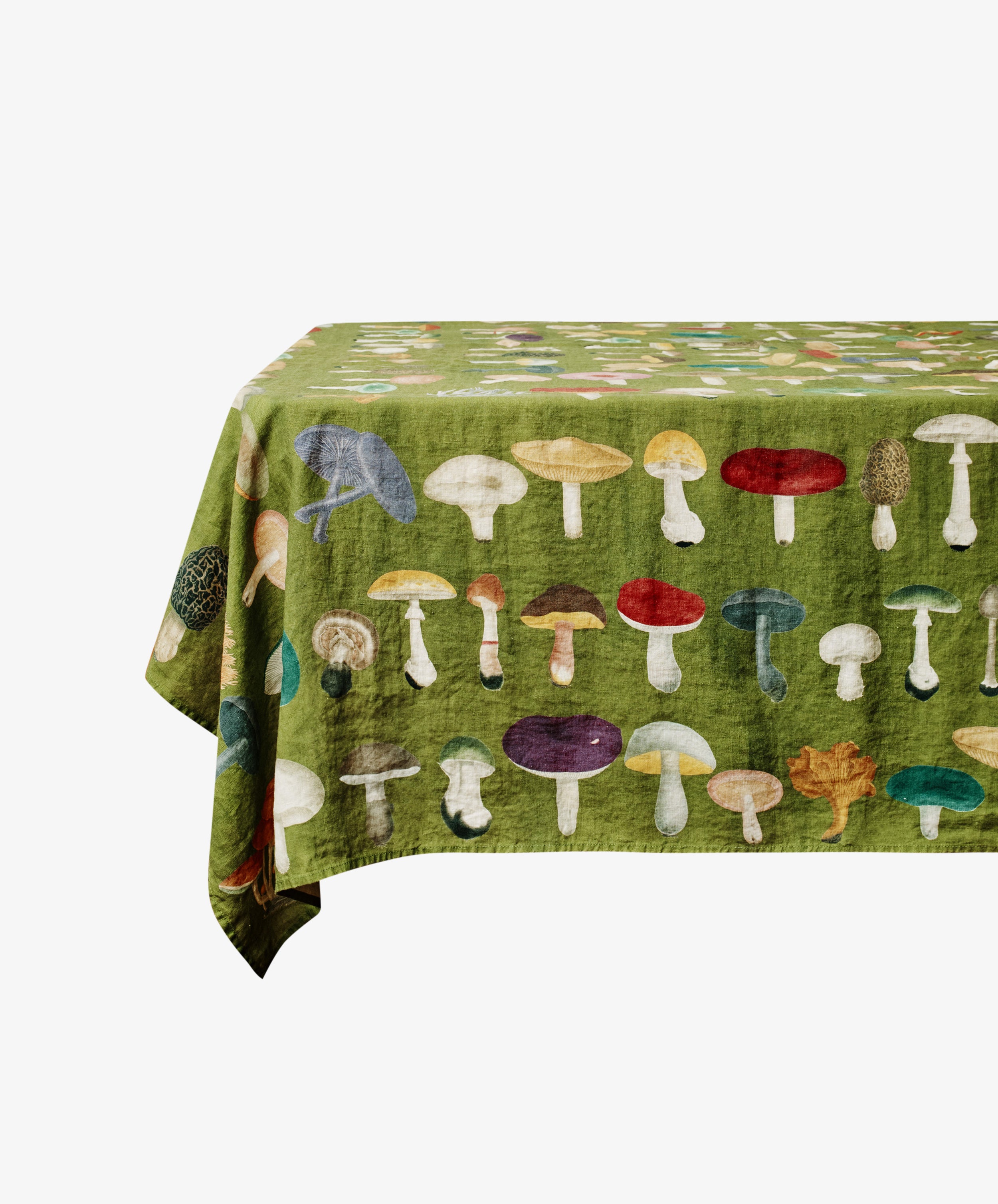 John Derian Fungi Tablecloth. Ghost image of tablecloth draped over a table. Side view.