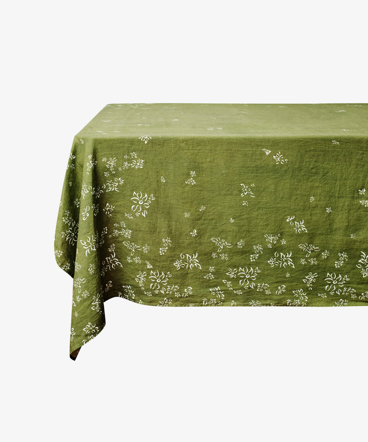 S&Bee Tablecloth. Ghost image of tablecloth draped over a table. Side view.