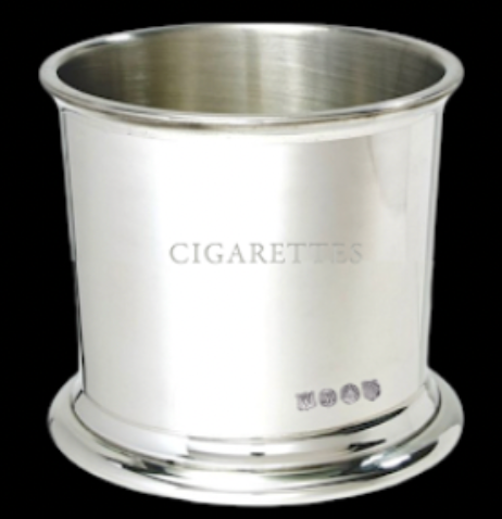 The Cleo Cigarette Cup is a silver cylindrical container with 