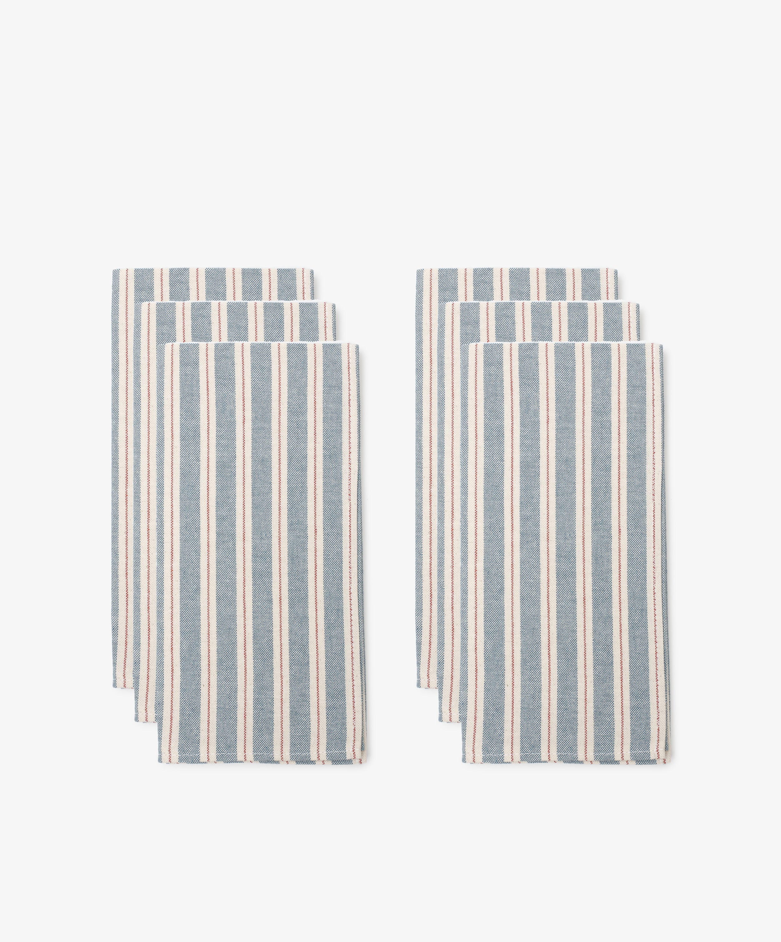 A set of six Martin Striped Napkins with vertical blue and white stripes is arranged in two neat groups on a white background.