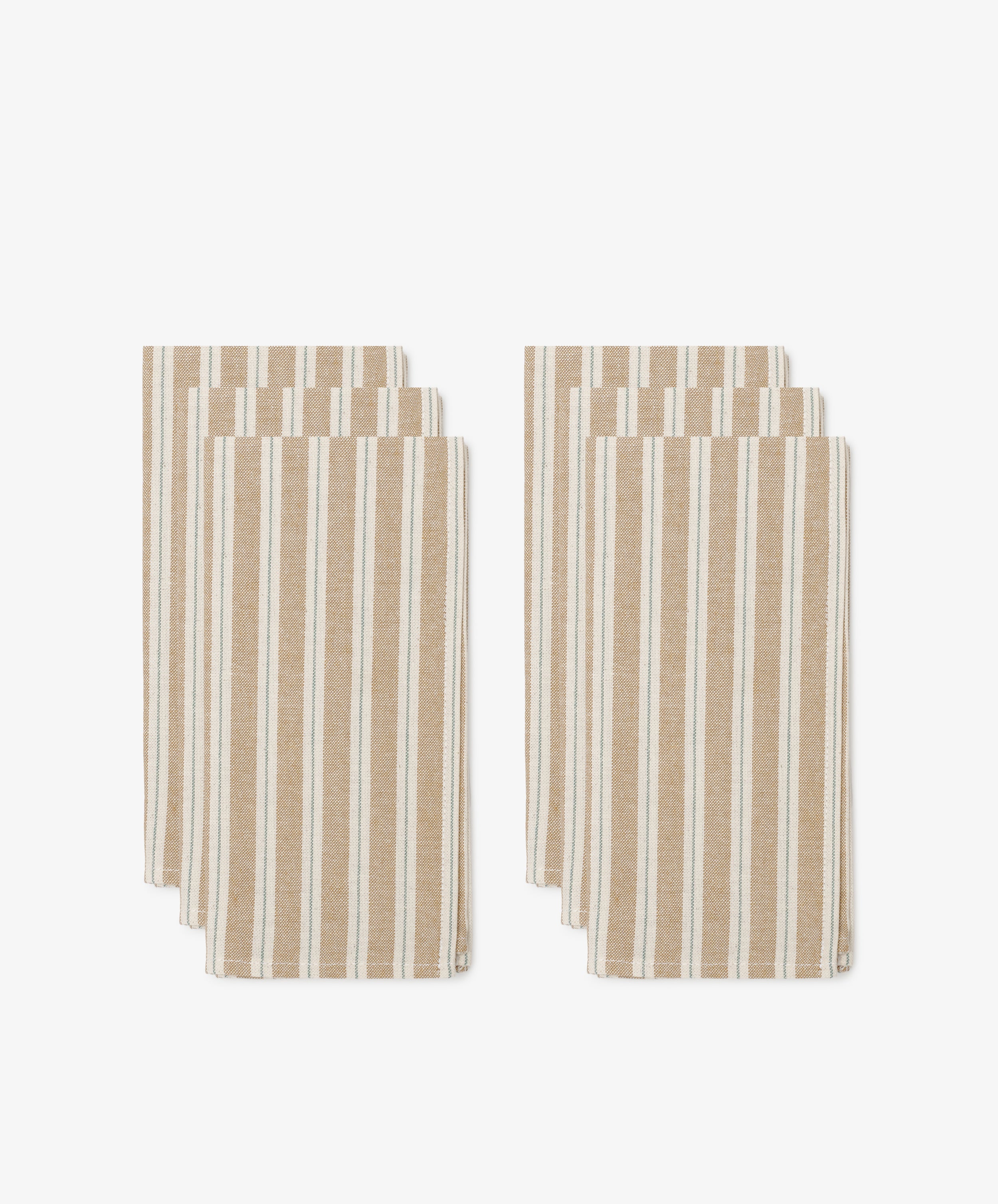 Six Martin Striped Napkins, featuring classic beige and white vertical stripes, are arranged in two stacks of three against a white background.