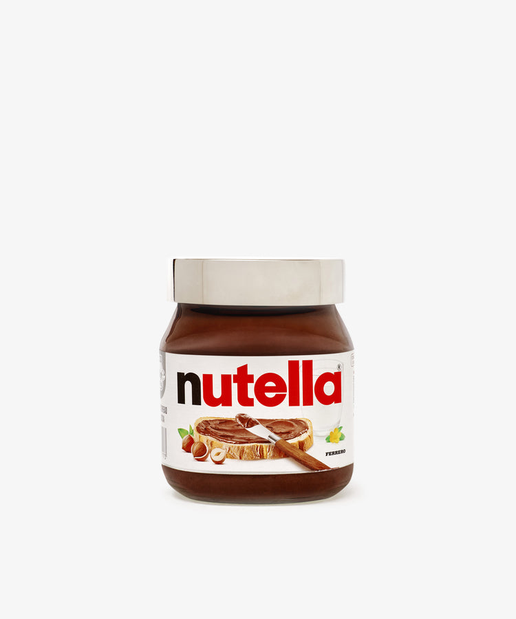 The Sterling Silver Nutella Lid adds luxury to your Nutella jar, featuring the brand name and an elegant design—perfect for elevating your pantry with refined style.
