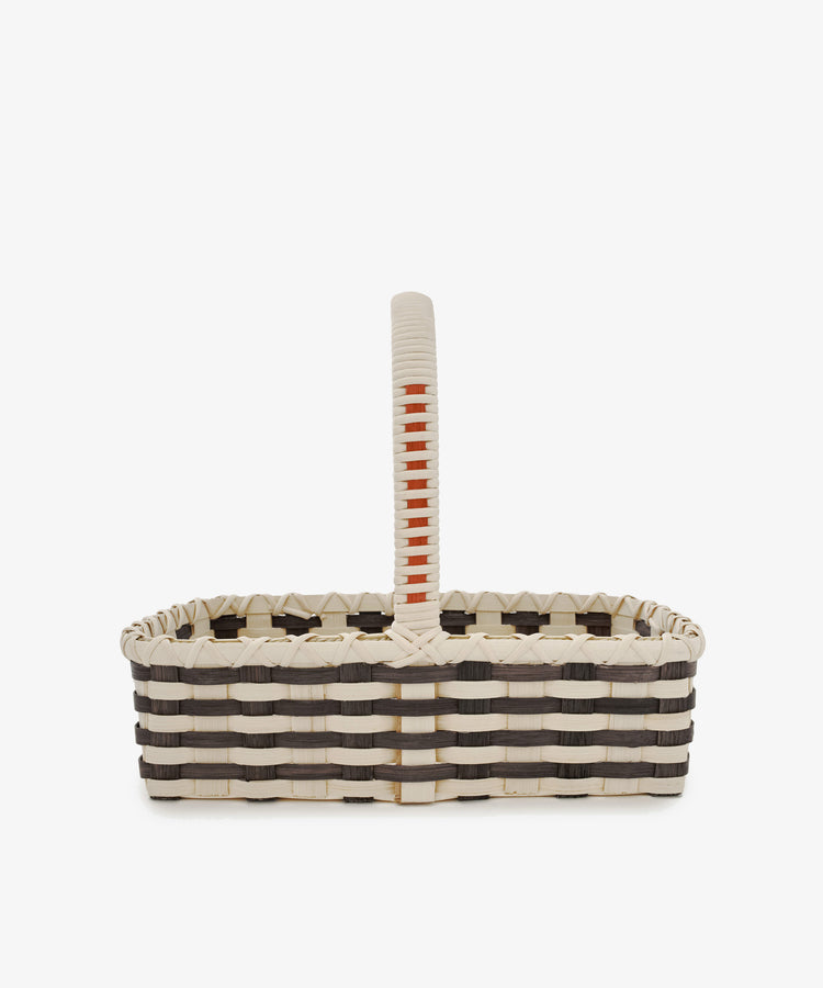 Folk Fleur Hand Basket: A rectangular woven market basket with black and white stripes and a central handle, displayed against a plain white background.
