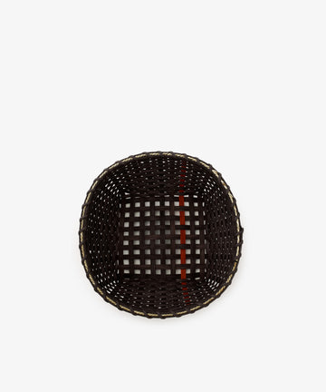 A Medium Love Basket, handwoven in a dark brown color with a square shape and open top, is displayed on a white background. The intricate weave features a single vertical red stripe as an accent.