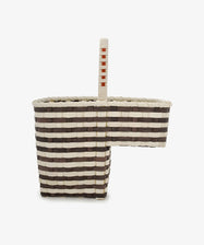 Introducing the Stair Tote—a handwoven basket designed for your staircase, featuring alternating cream and brown bands, a central handle, and a rectangular cutout on one side for easy access and elegant storage.