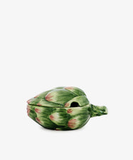 The Artichoke Sauce Bowl, designed as a ceramic artichoke with a removable lid and stem handle, adds Italian charm to your kitchen decor. Presented against a plain white background.