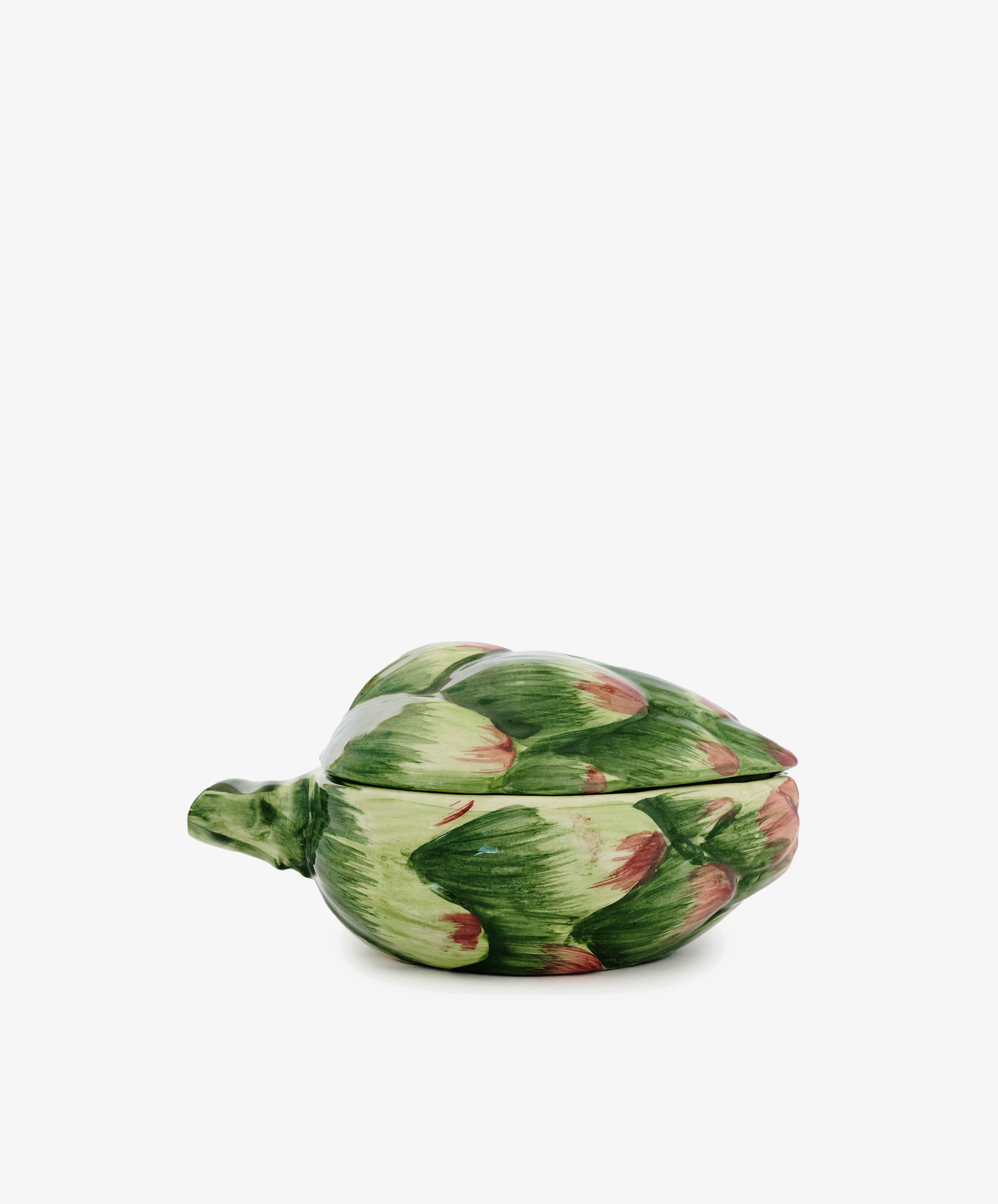 The Artichoke Sauce Bowl is shaped and painted like an artichoke with the lid on, creating a charming piece of Italian kitchen tableware. Shown against a plain white background.