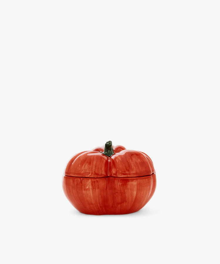Introducing the Tomato Sauce Bowl—a delightful ceramic piece shaped and painted to resemble a vibrant heirloom tomato with a green stem. This trompe l’oeil-inspired bowl brings whimsical charm and country house kitchen style to any setting with its playful design and crisp white background.