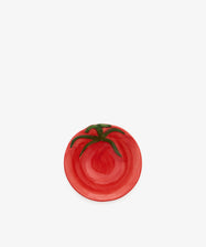 Introducing the Tomato Bowl: a small ceramic dish painted red with a green stem motif to mimic the look of a ripe tomato. Placed on a plain white background, its overripe glaze lends rustic charm to this whimsical piece—perfect as a playful accent atop any Italian farmhouse sideboard.