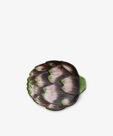 The Artichoke Small Plate features a ceramic design in green, purple, and pink hues, echoing the charm of Italian clay plates, and is beautifully showcased against a white background.