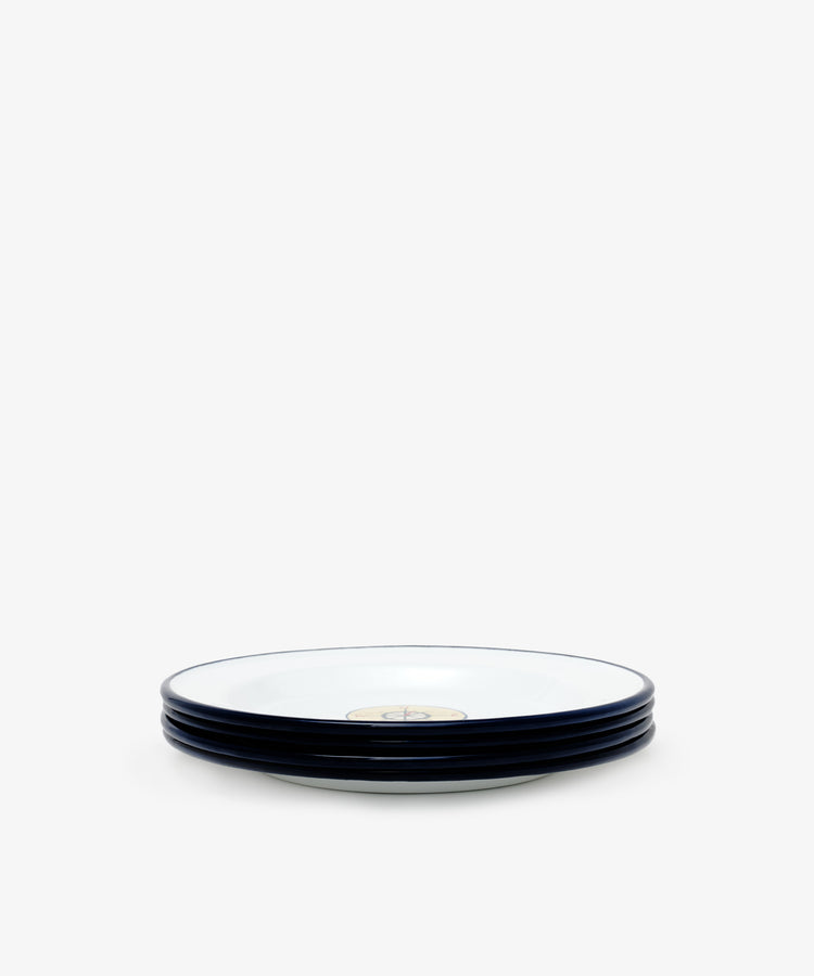 A set of four Camp Plates, featuring white enamel with dark rims, stacked side-by-side against a plain white background.