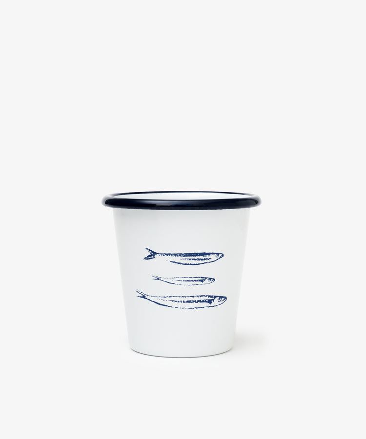 The Il Pesce Enamel Cup, Set of 2, features lightweight and durable cups with a dark rim and two blue sardine illustrations on a plain white background.