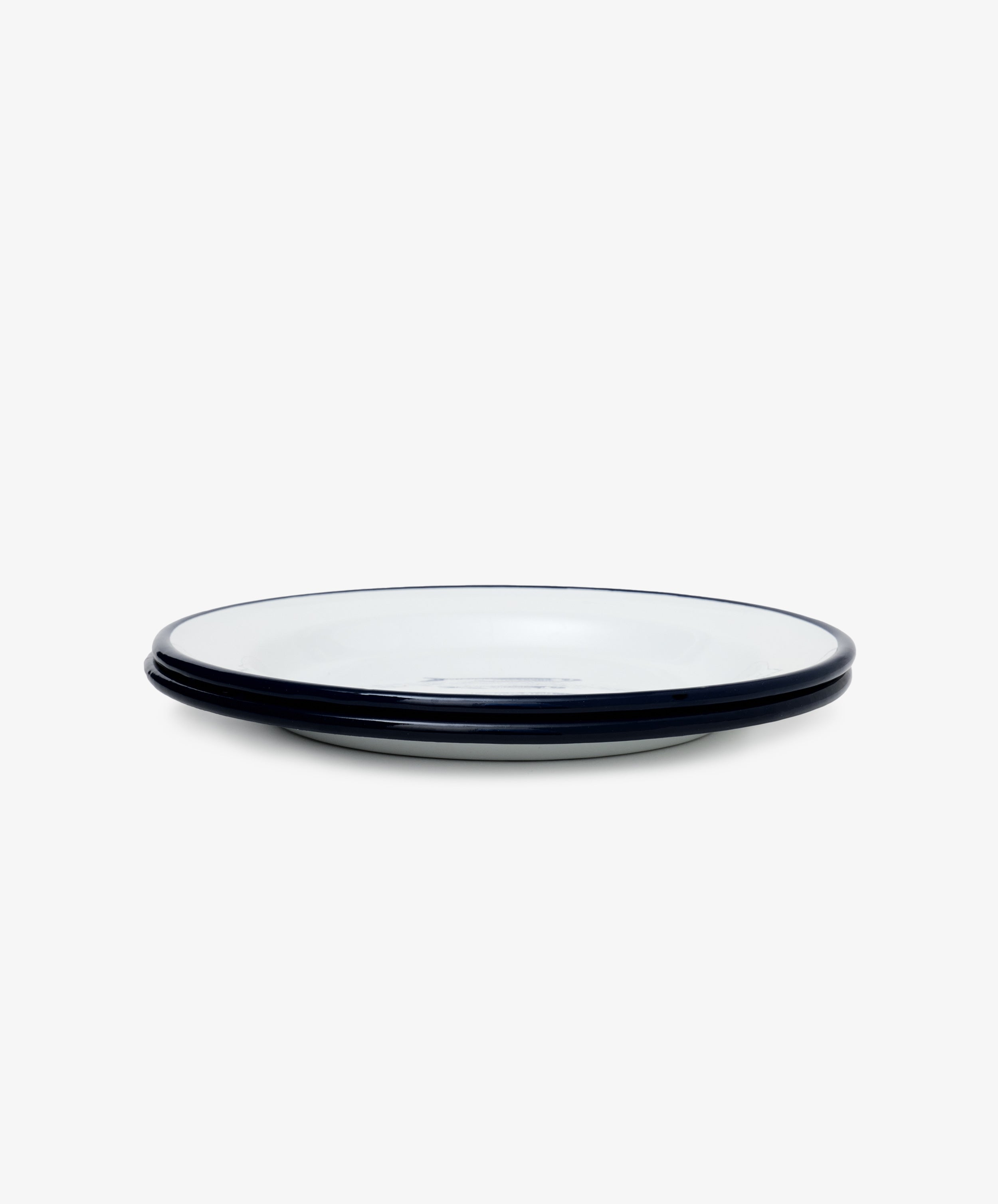 The Il Pesce Enamel Plate Set of 2 features stacked plates with a striking blue rim, displayed on a plain white background.