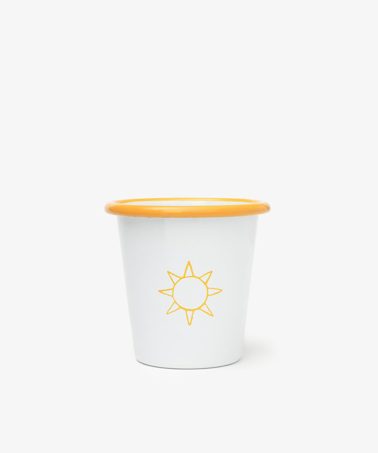 The Il Sole Enamel Cup, Set of 2, features a white finish with a yellow rim and a minimalist summer sun motif on the front, displayed against a plain white background.