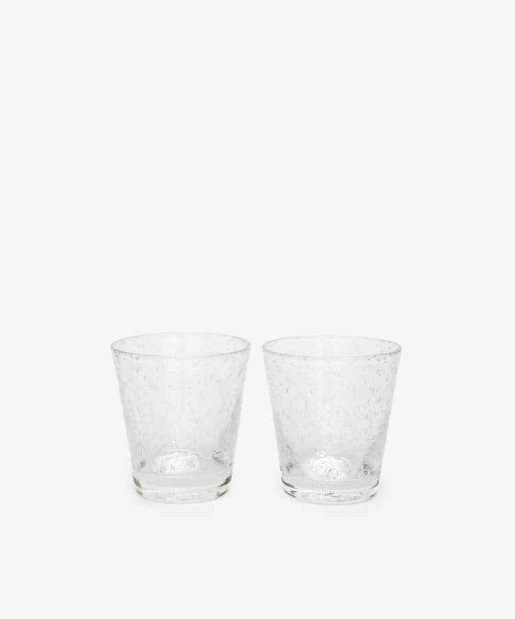 Lauren Water Glass. Two clear bubble glass tumblers side-by-side.