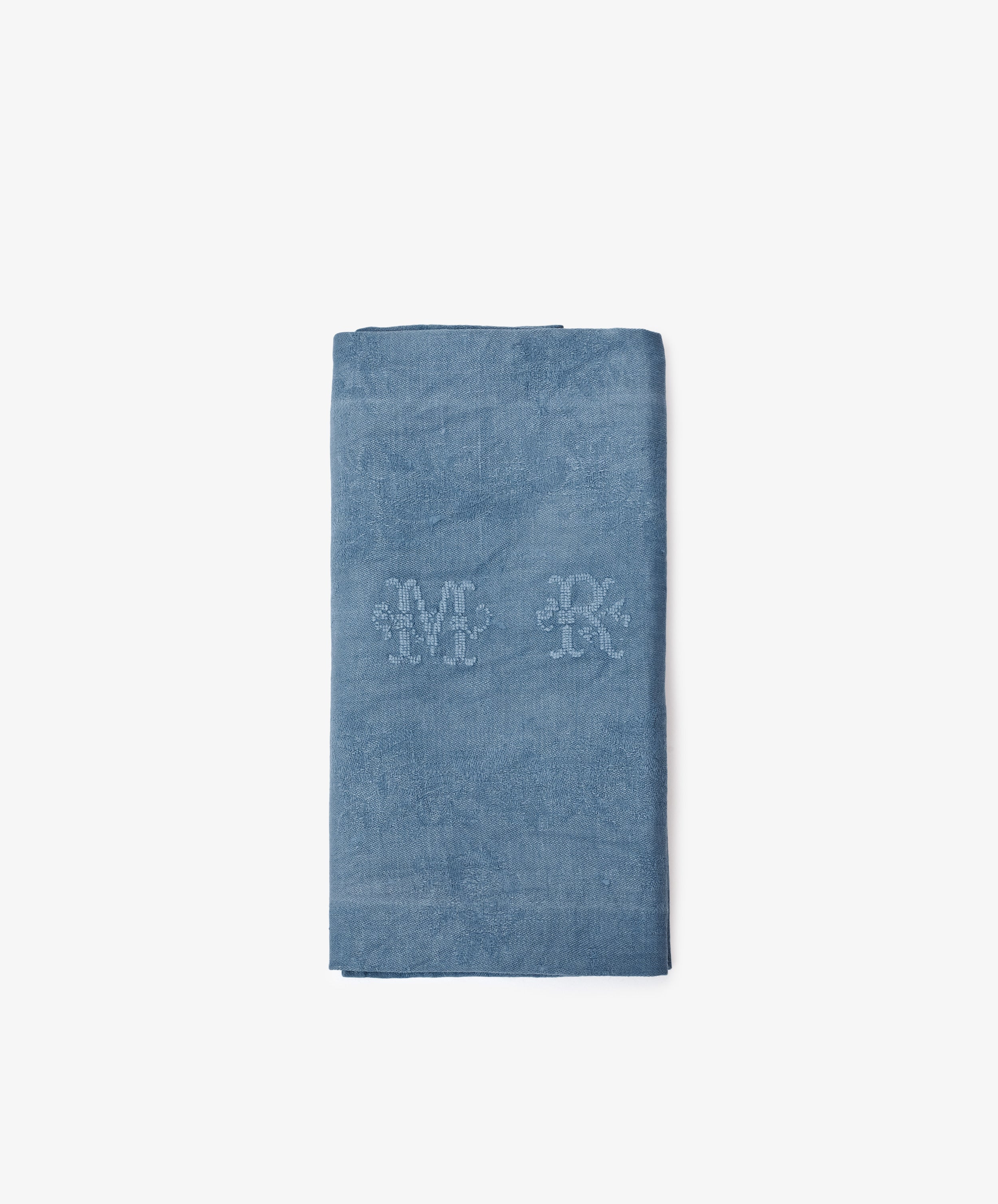 A set of 6 vintage blue damask linen napkins with embroidered M and R initials at the center, shown folded on a plain white background.