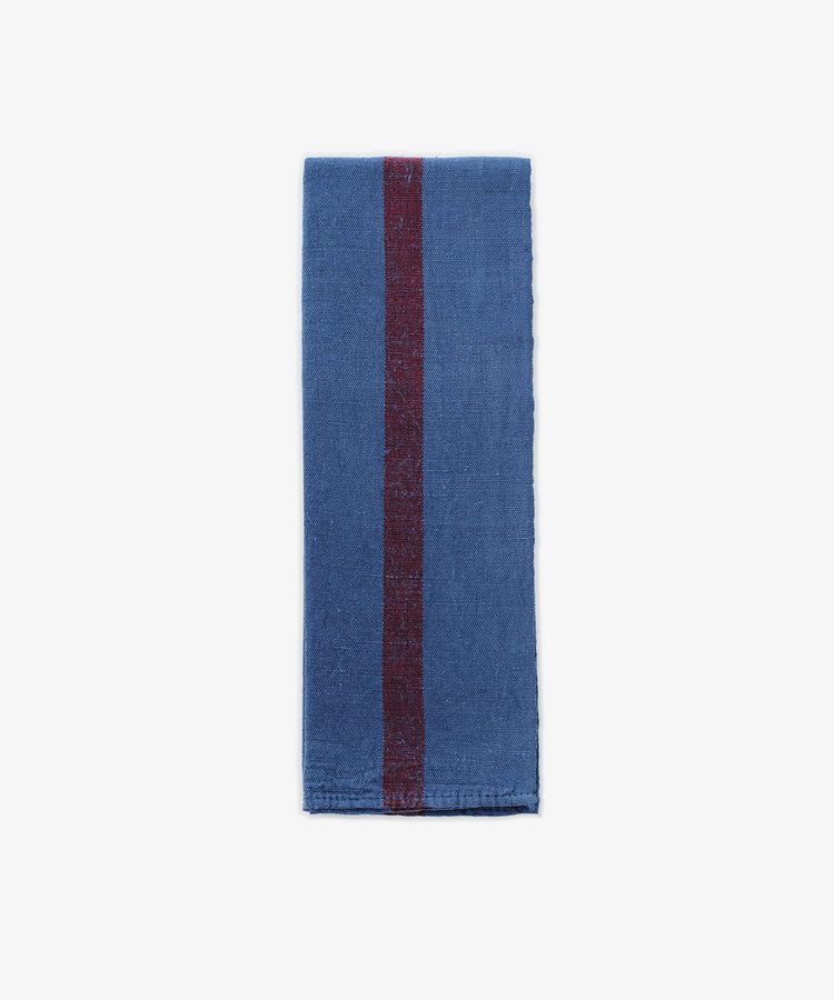 The French Vintage Tea Towel is a folded blue cloth napkin with a vertical maroon stripe down the center, reminiscent of classic Provence linen, displayed on a white background.