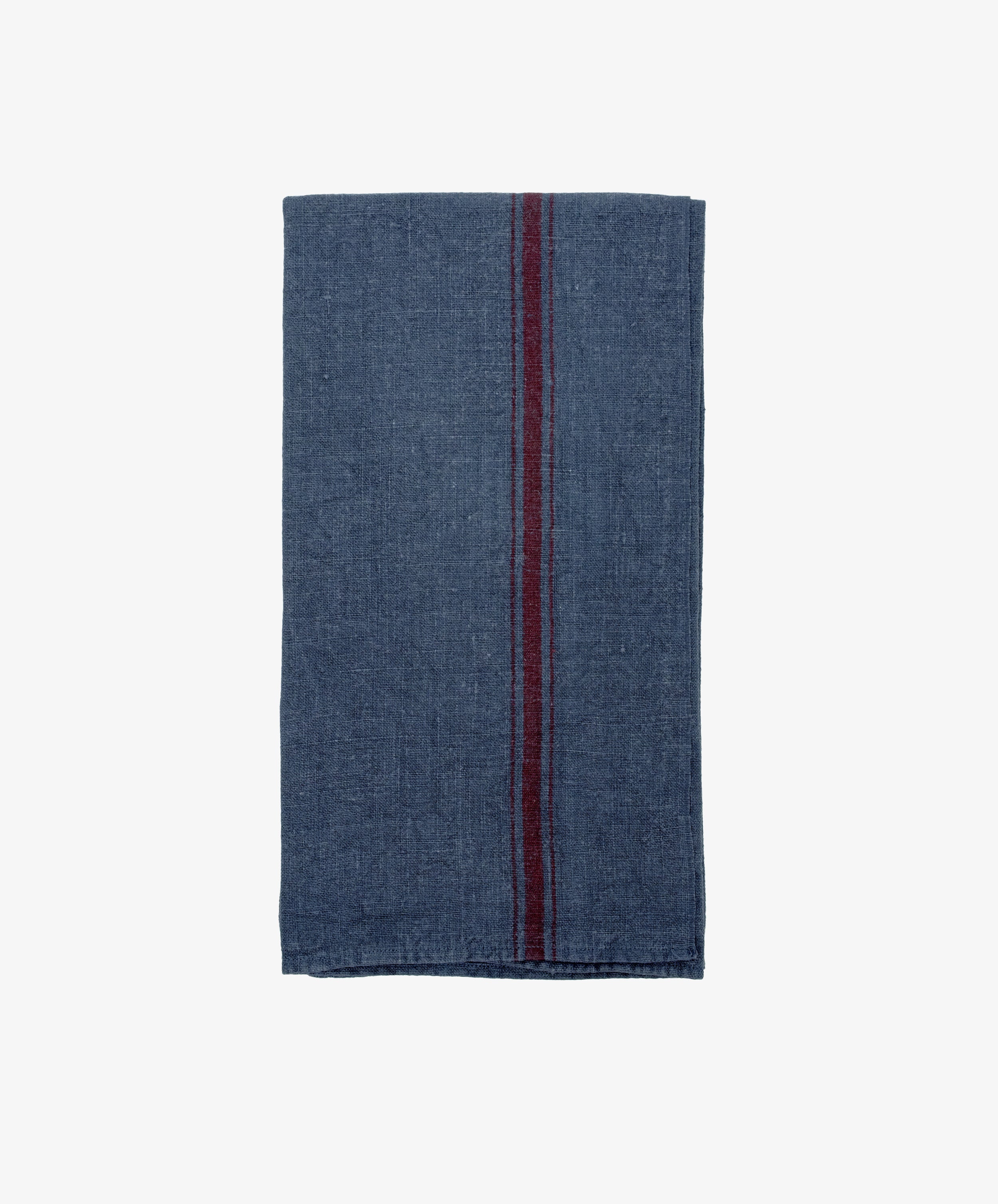 The French Vintage Tea Towel features a folded dark blue cloth with a single vertical maroon stripe, evoking classic Provence linen—ideal for enhancing any kitchen décor and photographed on a plain white background.