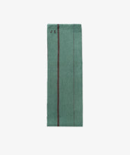 The French Vintage Tea Towel is a folded green linen with thin vertical stripes and 