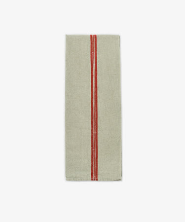 The French Vintage Tea Towel features a rectangular beige design with a single vertical red stripe down the center, evoking classic Provence style and vintage linen charm—an elegant addition to any kitchen décor. Displayed on a plain white background.