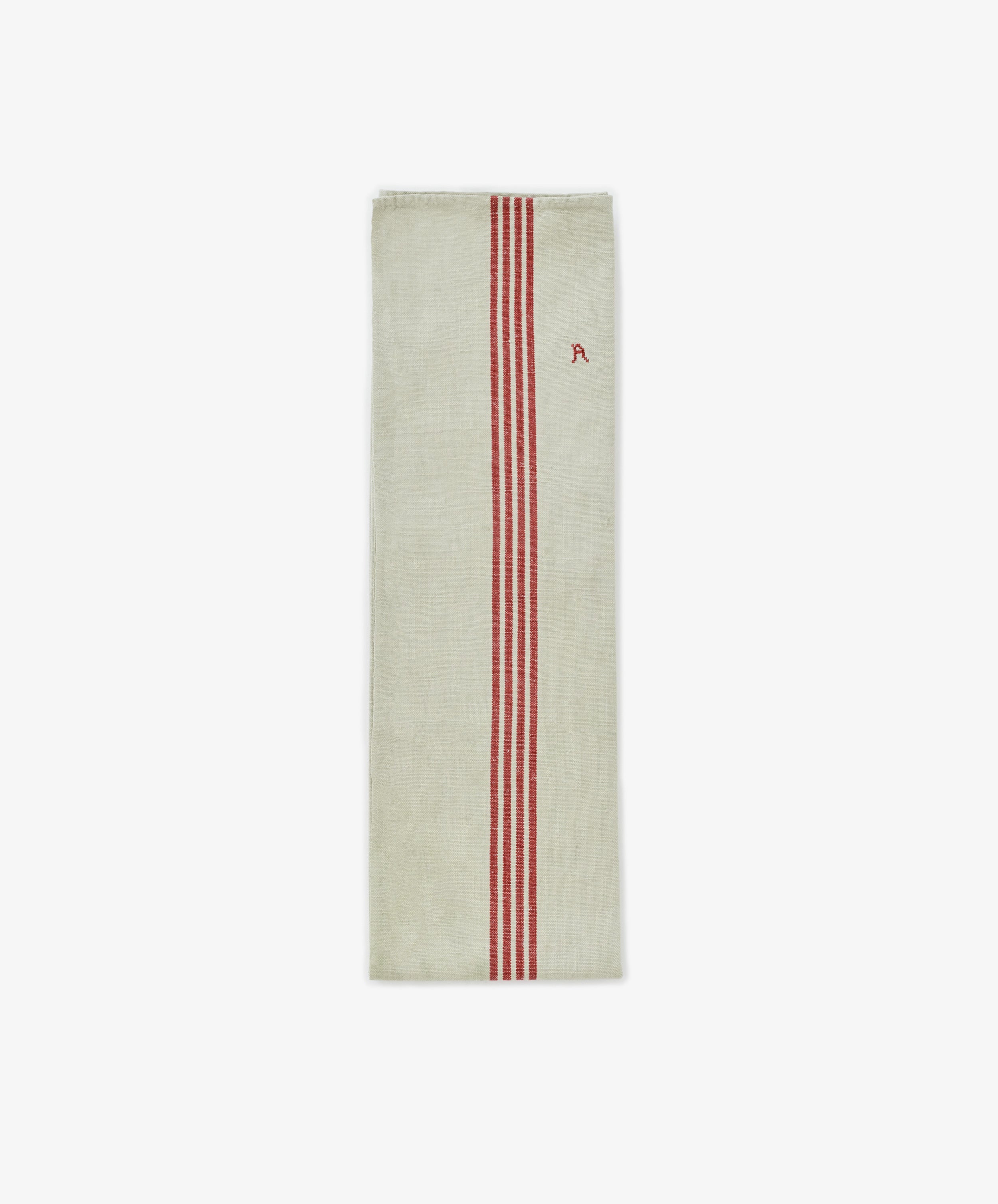 The French Vintage Tea Towel is a rectangular beige linen towel inspired by Provence, featuring three vertical red stripes and a small red embroidered letter A—ideal for adding classic charm to your kitchen.
