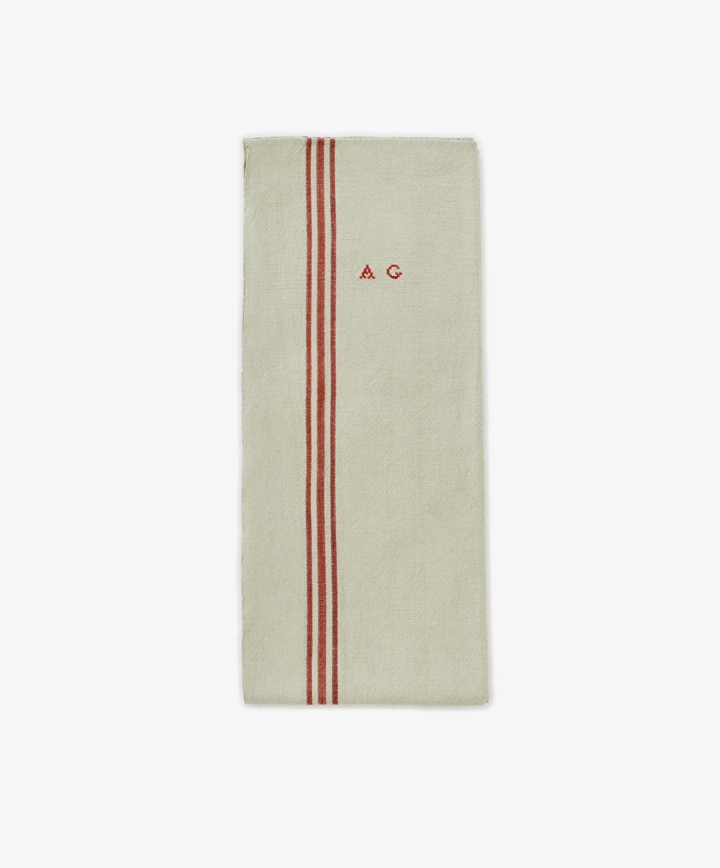 The French Vintage Tea Towel is a beige rectangular cloth napkin with two vertical red stripes and 
