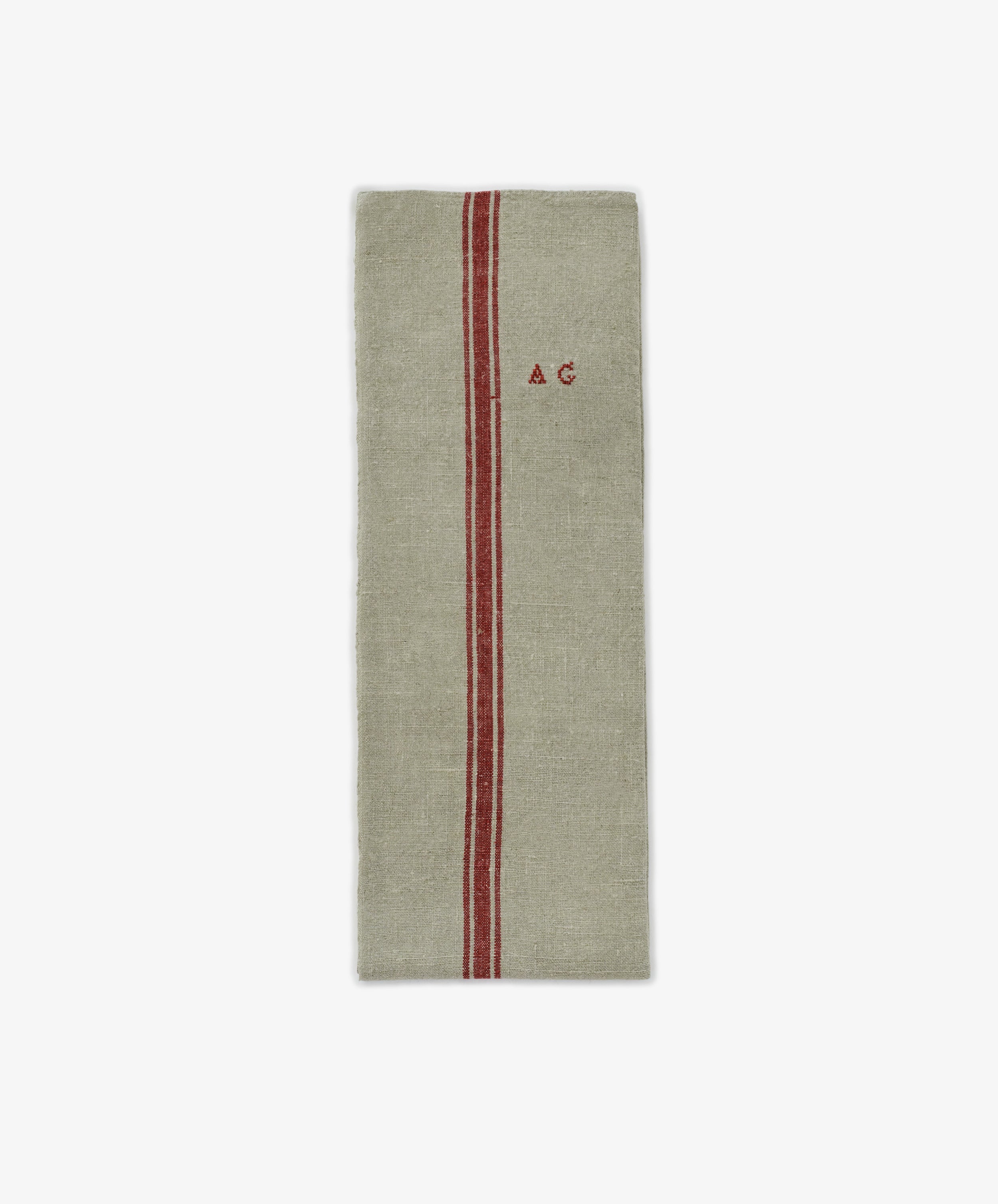 The French Vintage Tea Towel is a rectangular beige linen cloth with a single red vertical stripe and 