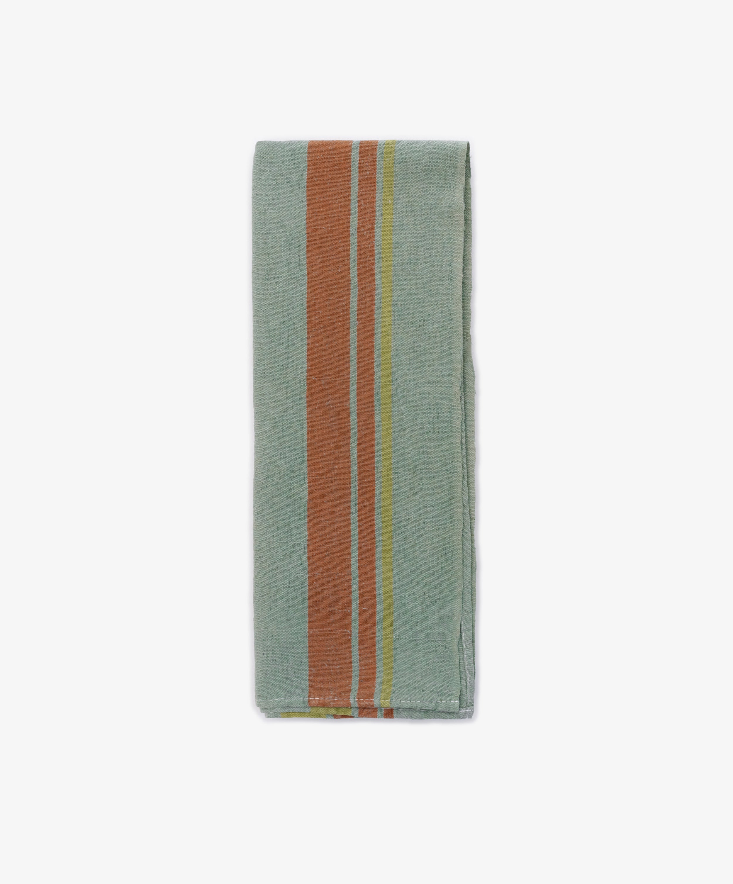 The French Vintage Tea Towel, a folded light blue-green cloth napkin with vertical orange and yellow stripes on one side, is displayed against a white kitchen background.