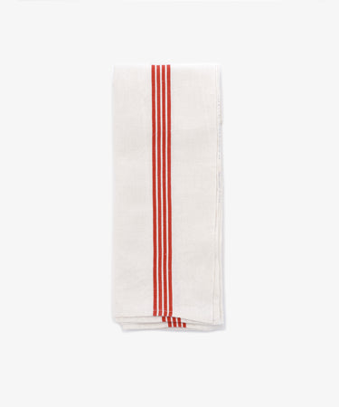 A French Vintage Tea Towel, featuring a neatly folded white cloth with three vertical red stripes near the edge, reminiscent of classic red stripe tea towels, displayed on a plain white background.