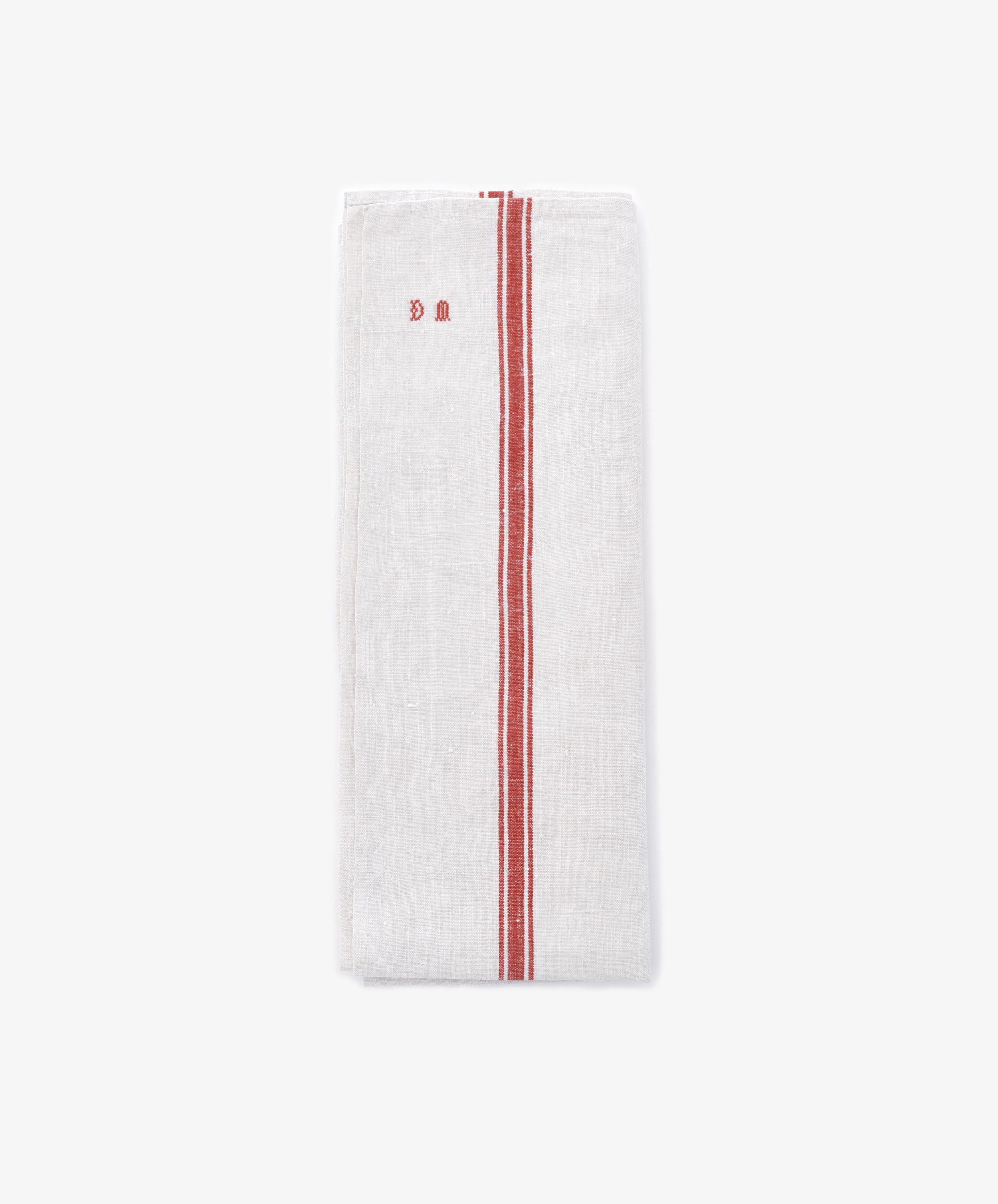 The French Vintage Tea Towel features two parallel red stripes and small red embroidered initials near the top left, styled folded on a plain light background.