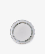 The Patton Bottle Coaster is a round, plain stainless steel plate shown on a white background, crafted to protect tables and prevent condensation effectively.