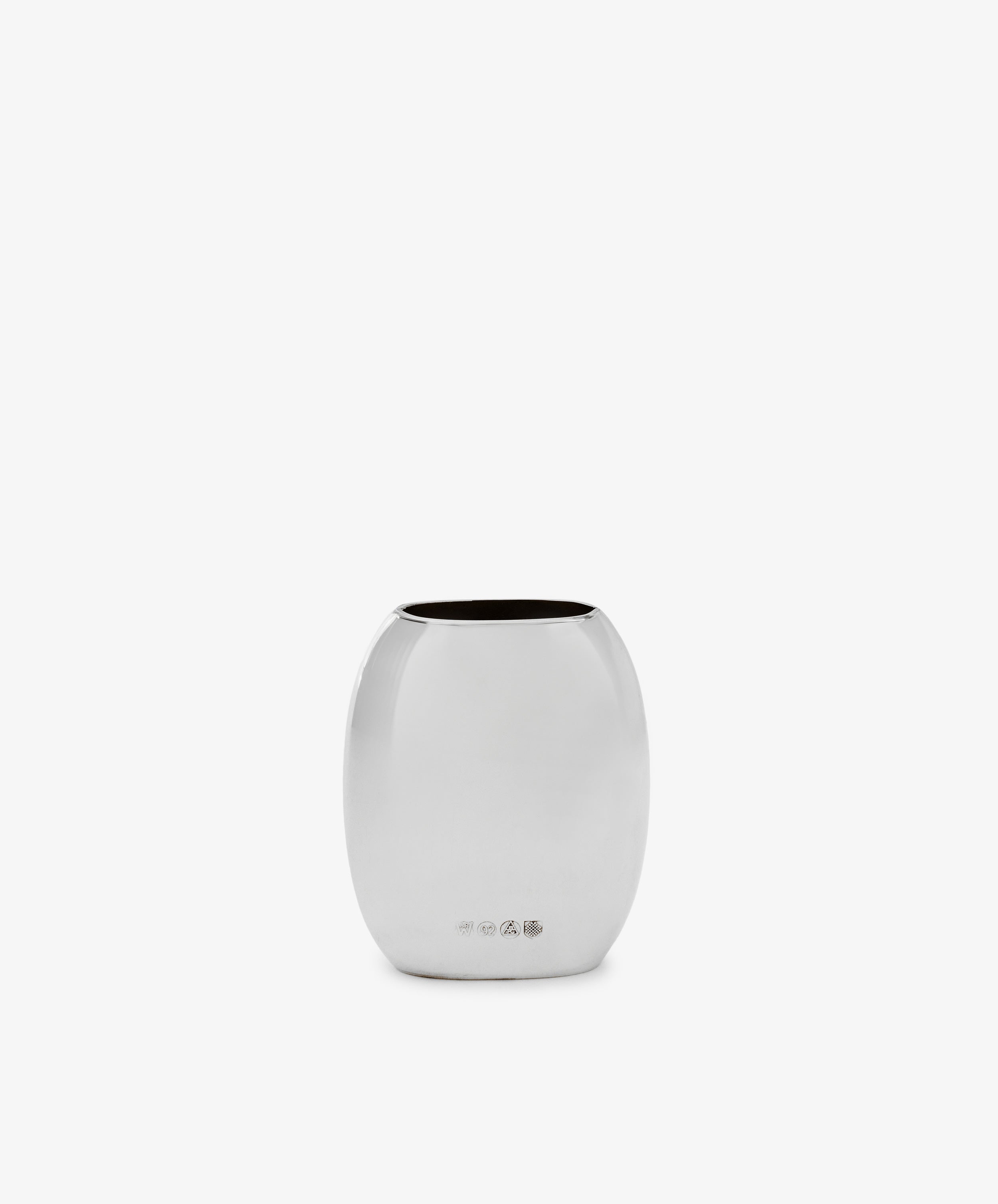 The Vera Oval Budvase, a small, rounded vase with a polished silver pewter finish, stands upright against a plain white background.