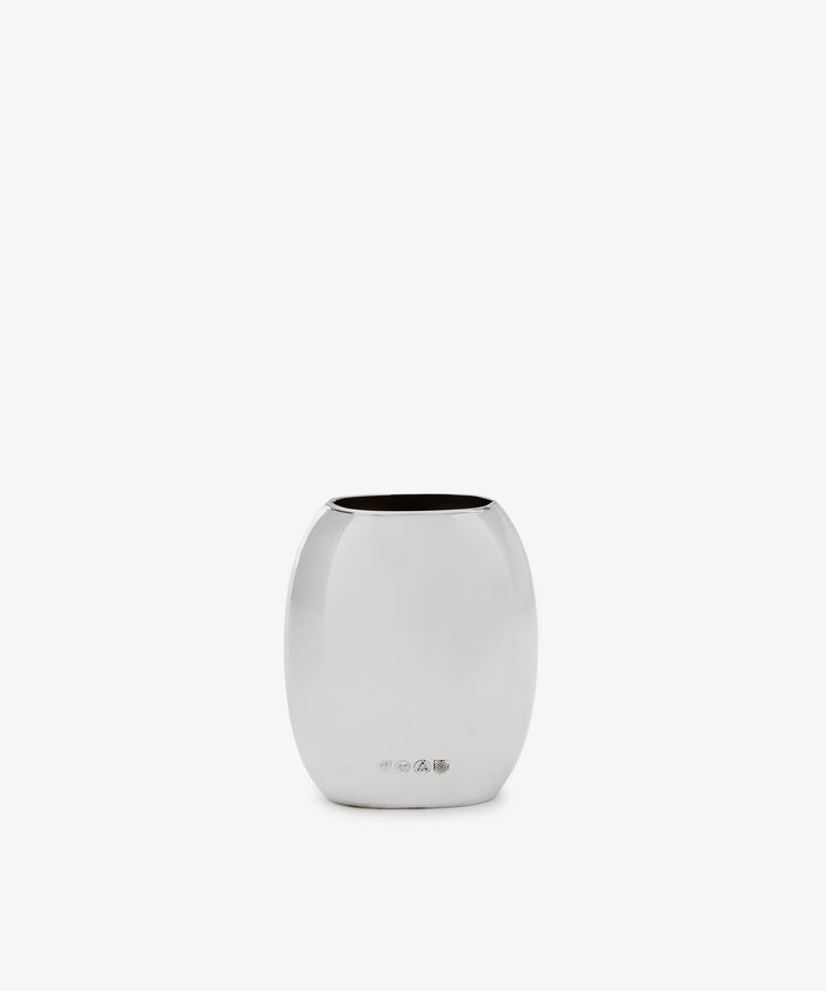 The Vera Oval Budvase, a small, rounded vase with a polished silver pewter finish, stands upright against a plain white background.