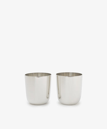 The Alexander Stemless Tumbler Set of 2, crafted from stainless steel, sits side by side on a plain white background, exuding modern sophistication.