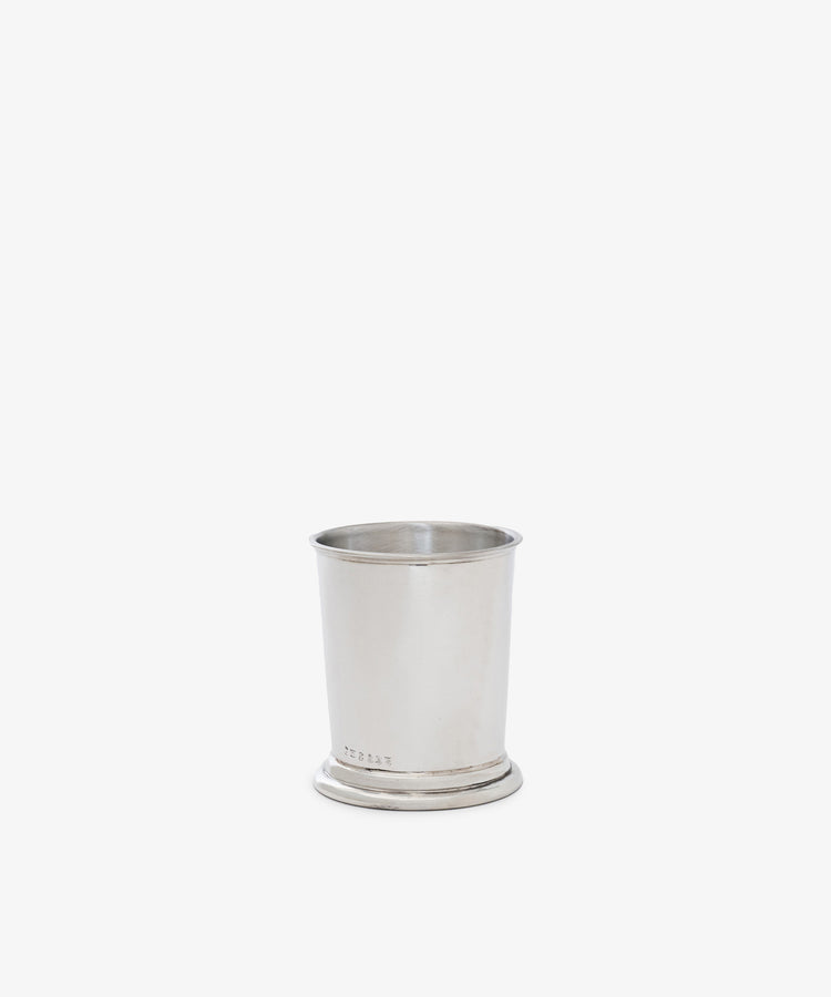 The Clara Julep Cup features plain silver with a slightly flared rim and small circular base, evoking classic home decor. Perfect as a pewter julep cup, it is photographed against a white background.