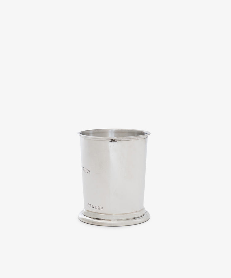 The Serena Pencil Cup is a plain, silver-colored pewter holder featuring a slightly flared rim and round base, displayed on a white background.