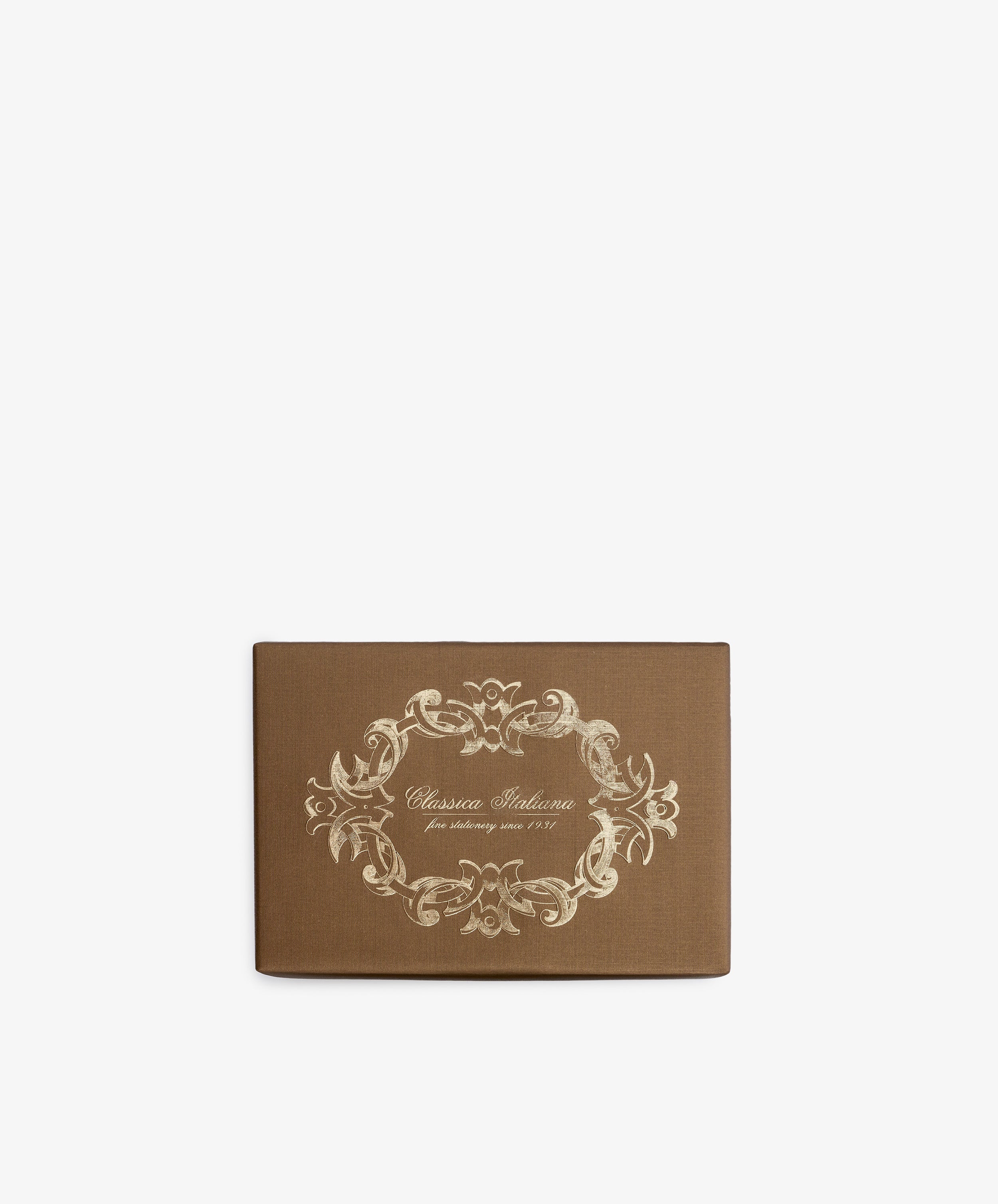 Rectangular brown box with an ornate, cream-colored decorative border and the text “Classica Italiana fine stationery since 1901” on the lid, set against a plain white background. Contains the Bordered Correspondence Card & Envelope, Set of 25—perfect for holding wedding thank-you cards or elegant cream envelopes crafted from luxurious cotton paper.
