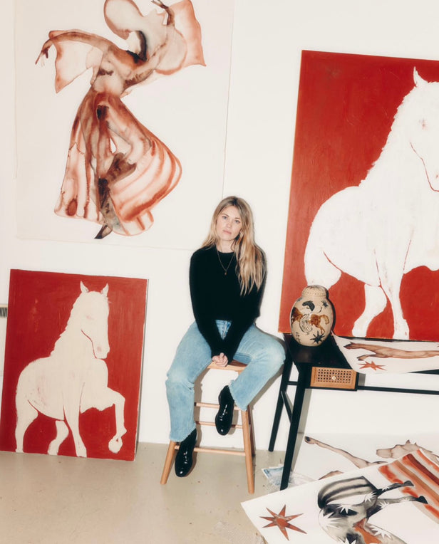 woman with blond hair sitting