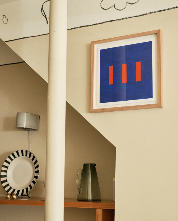 bue and red painting on wall in a shop