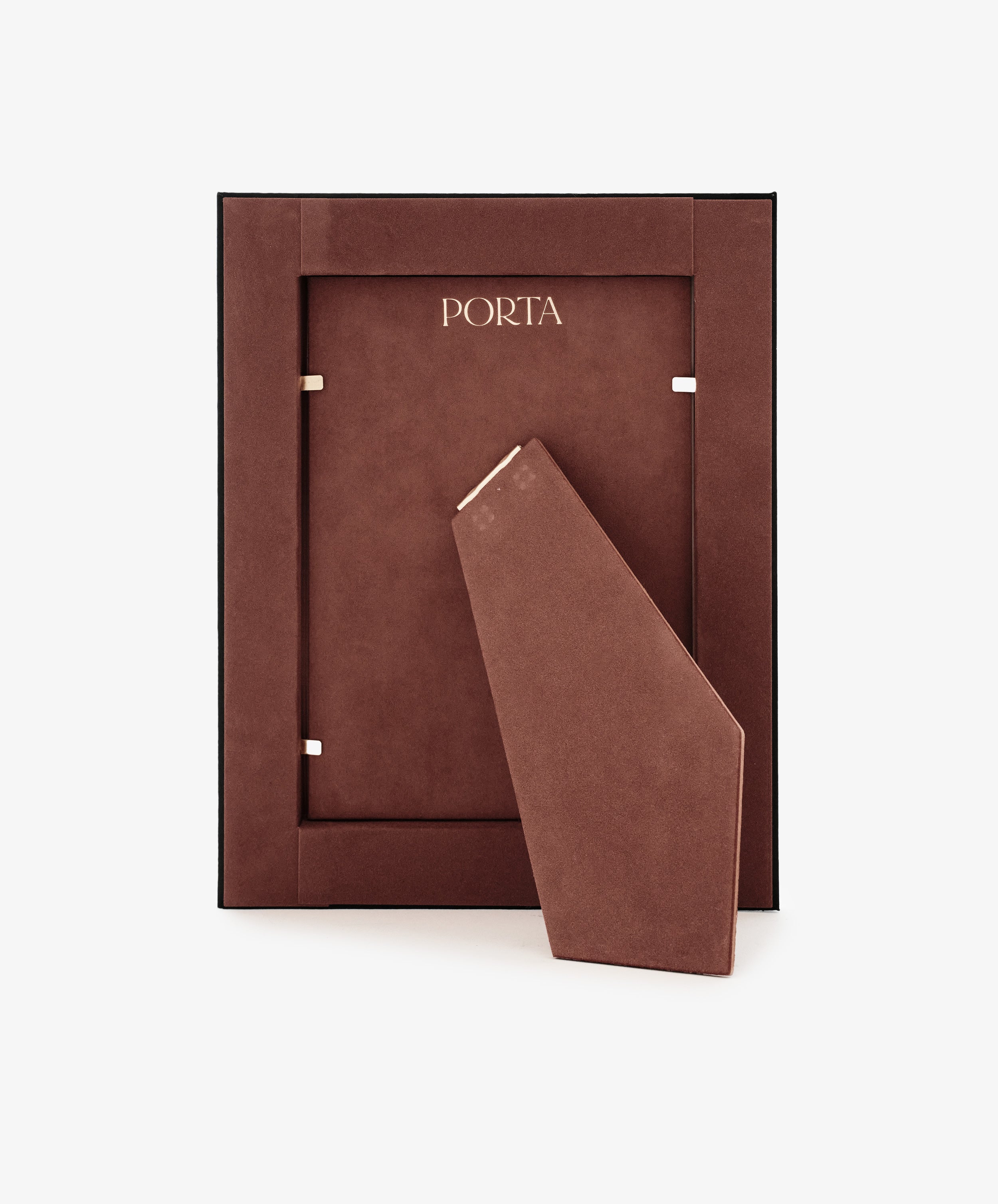 The Torino Frame is a brown, rectangular wood picture frame shown standing upright with its back support arm extended, set against a plain white background. The word 