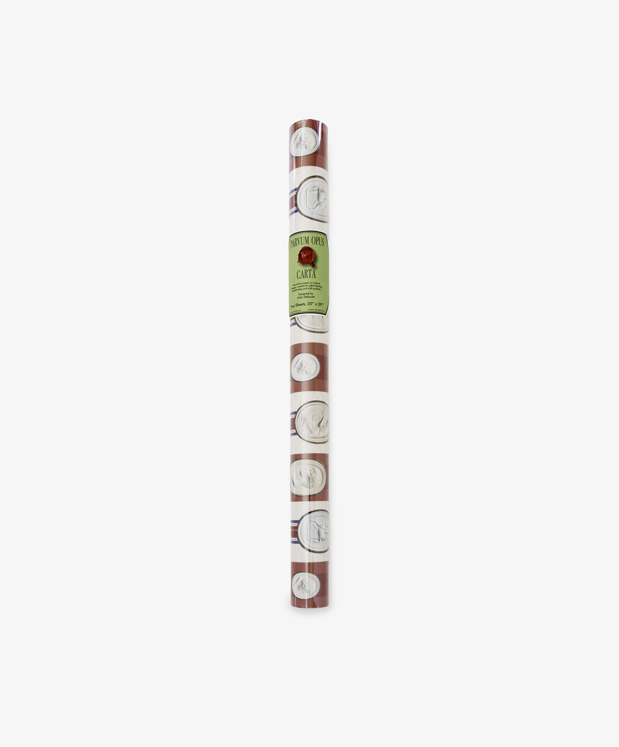 A rolled sheet of Intaglio Stripe Gift Wrap in brown, featuring a repeating pattern of white circles and line drawings, labeled with a green Parvum Opus sticker.