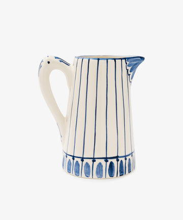 Jorge Jug. Glazed ceramic pitcher in white with blue stripes and accents, alt side view.
