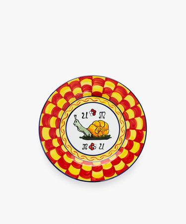 Palio Small Plate in white glazed ceramic with red and yellow designs and snail motif.