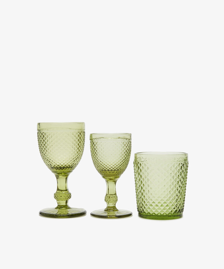 A set of six Celeste White Wine Glasses is arranged side by side on a plain white background.