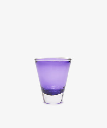 Single transparent purple drinking glass.