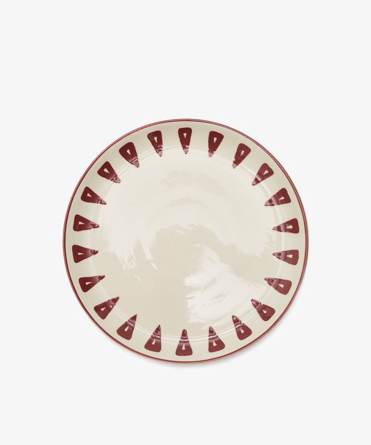 Daria Small Plate. Glazed white stoneware plate with burgundy triangle pattern border, variation (each is unique)